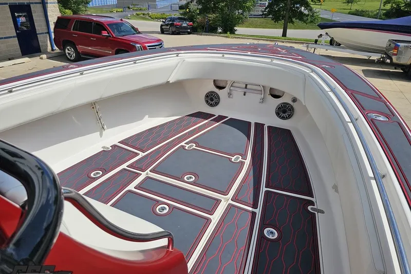 Slide: The Image of 2005 Fountain 34 Sportfish CC Open Bow with stylish deck design and spacious seating. - 76