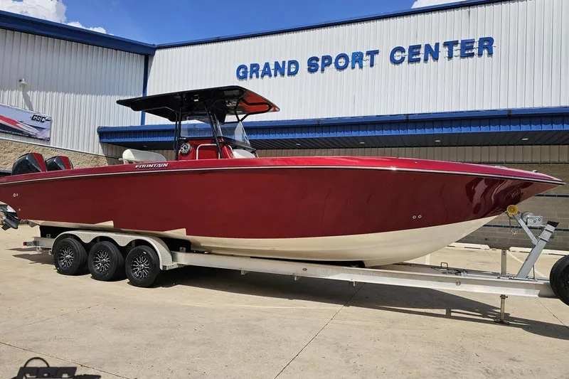 Slide: The Image of 2005 Fountain 34 Sportfish CC Open Bow boat on trailer at Grand Sport Center. - 12