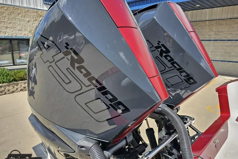 Slide: The Image of Twin Mercury Racing 450R outboard engines on a 2005 Fountain 34 Sportfish CC Open Bow. - 96