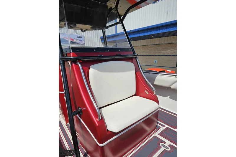 Slide: The Image of 2005 Fountain 34 Sportfish CC Open Bow with red and white seating detail. - 84