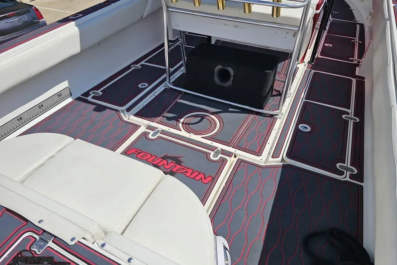 Slide: The Image of 2005 Fountain 34 Sportfish CC Open Bow interior with custom flooring and seating. - 46