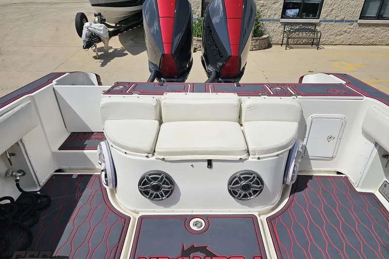 Slide: The Image of 2005 Fountain 34 Sportfish CC Open Bow with dual engines and cushioned seating. - 93