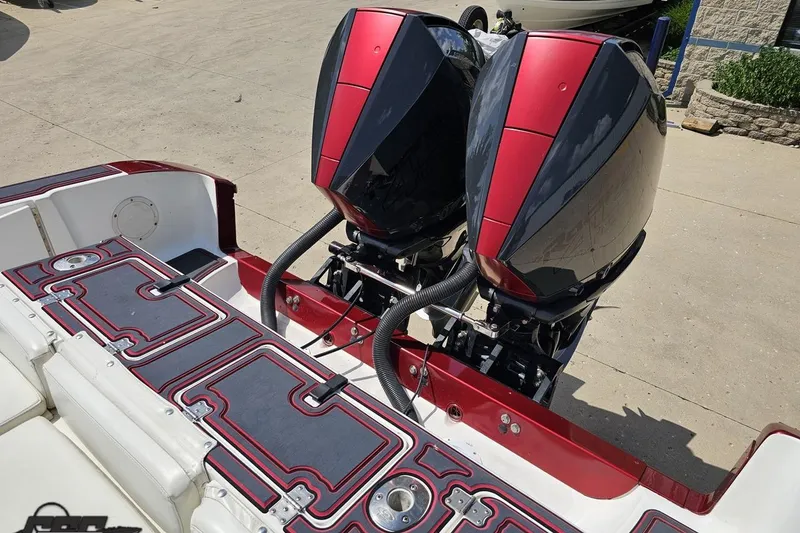 Slide: The Image of Twin outboard engines on a 2005 Fountain 34 Sportfish CC Open Bow boat. - 39
