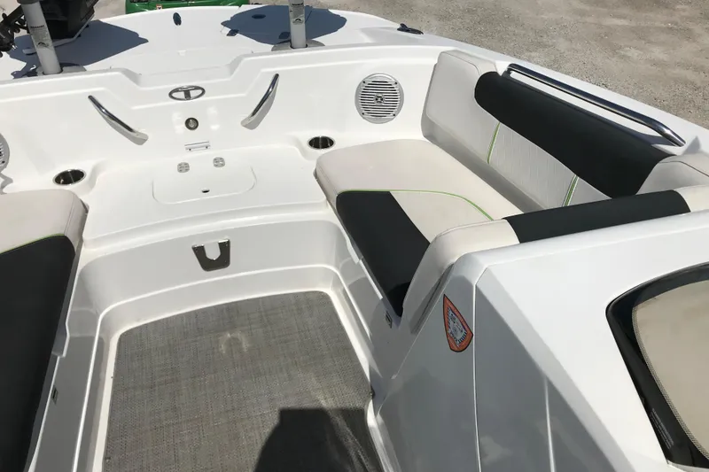 Slide: The Image of Interior of a 2021 Tahoe 1950 boat with sleek seating and modern design. - 14