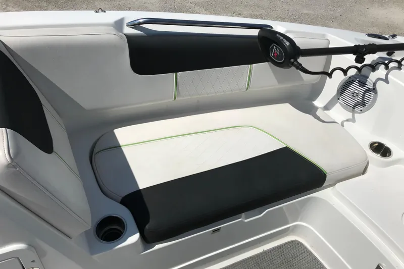Slide: The Image of Interior seating of a 2021 Tahoe 1950 boat with modern design and speaker system. - 15