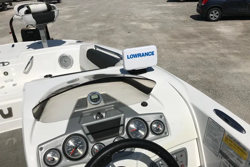 Slide: The Image of Dashboard of a 2021 Tahoe 1950 boat with Lowrance navigation system. - 13