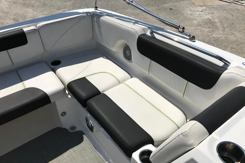 Slide: The Image of Interior seating of a 2021 Tahoe 1950 boat with white and black upholstery. - 19