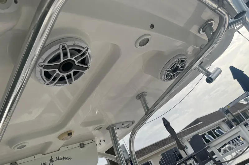 Slide: The Image of 2017 Sportsman Open 212 Center Console boat speakers and rod holders. - 32