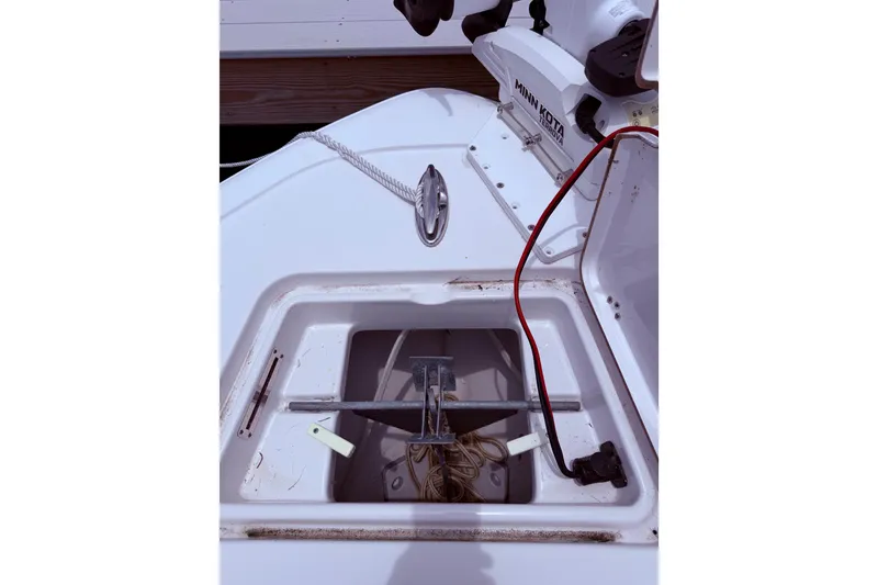 Slide: The Image of 2017 Sportsman Open 212 Center Console boat anchor storage with Minn Kota trolling motor. - 26
