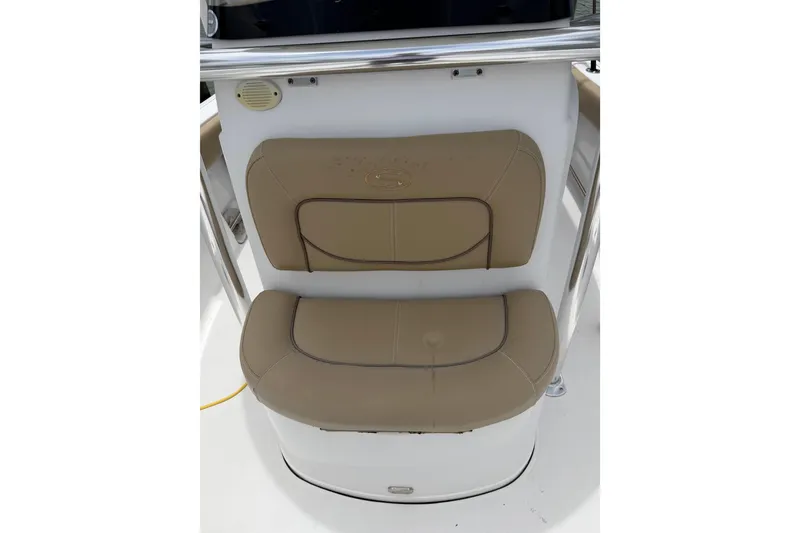 Slide: The Image of 2017 Sportsman Open 212 Center Console boat seat with tan upholstery. - 8