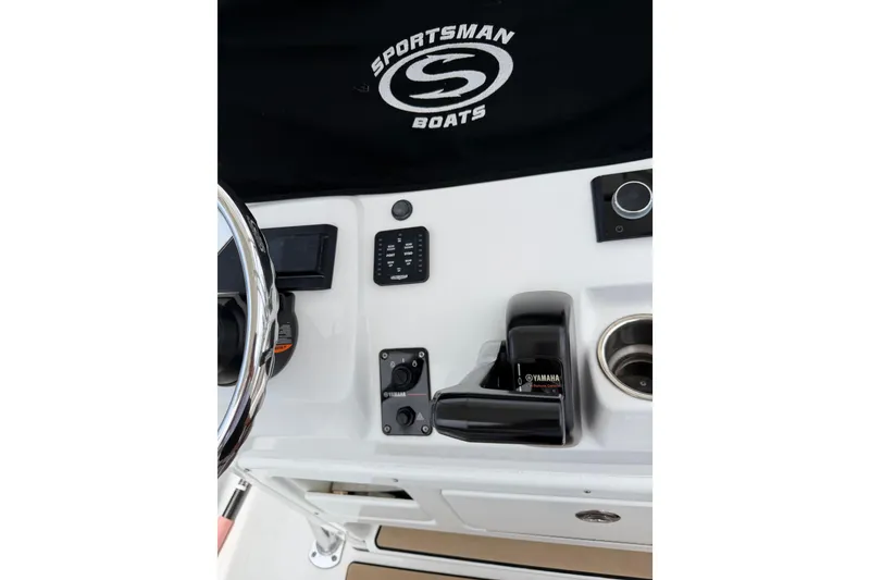 Slide: The Image of 2017 Sportsman Open 212 Center Console dashboard with Yamaha controls and steering wheel. - 18