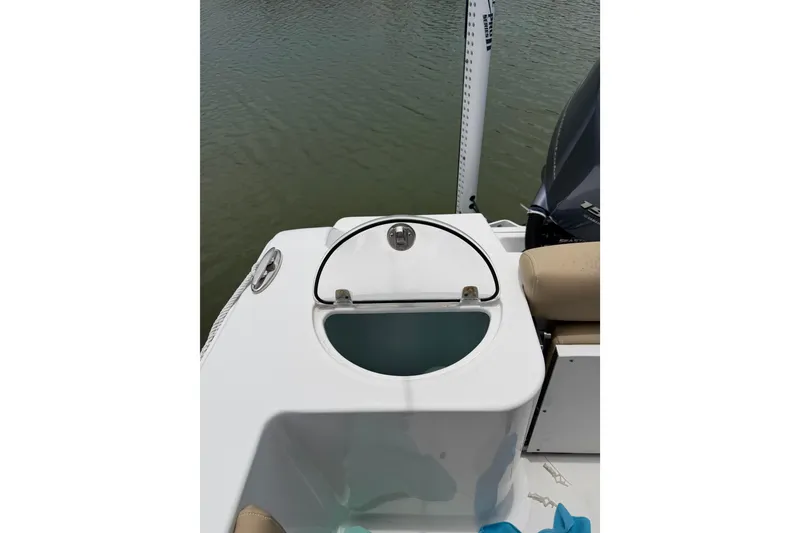 Slide: The Image of 2017 Sportsman Open 212 Center Console boat with livewell and seating. - 16