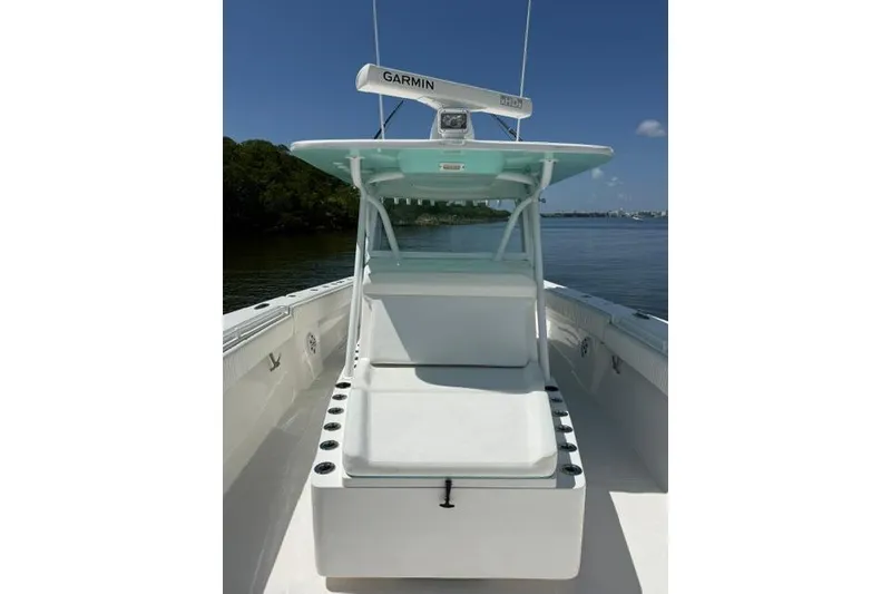 Slide: The Image of 2016 SeaHunter 41 Tournament boat with Garmin equipment, docked on a sunny day. - 22