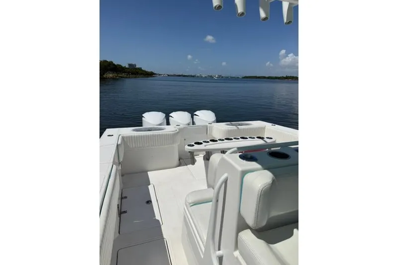 Slide: The Image of 2016 SeaHunter 41 Tournament boat with spacious deck and scenic water view. - 21