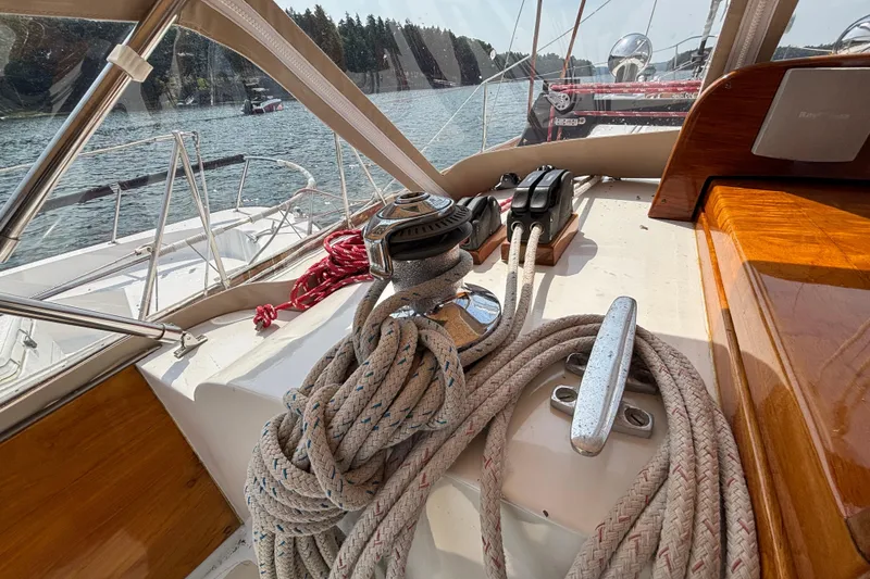 Slide: The Image of Cockpit view of 1974 Hinckley Bermuda 40 MKIII sailboat with ropes and winch. - 14