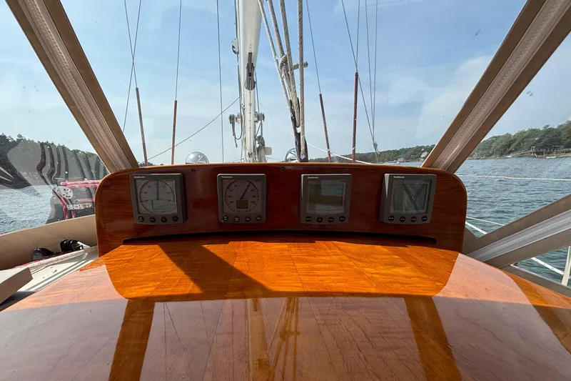 Slide: The Image of Hinckley Bermuda 40 MKIII cockpit with navigation instruments, 1974 model, on a sunny day at sea. - 16