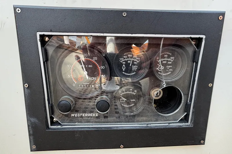 Slide: The Image of Instrument panel of a 1974 Hinckley Bermuda 40 MKIII sailboat with Westerbeke gauges. - 46
