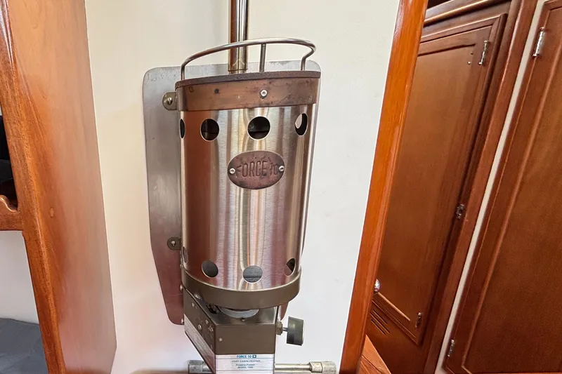 Slide: The Image of Stainless steel heater inside 1974 Hinckley Bermuda 40 MKIII yacht cabin. - 28