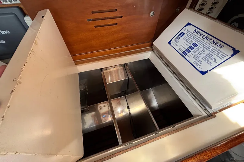 Slide: The Image of Interior storage compartment of a 1974 Hinckley Bermuda 40 MKIII sailboat. - 35