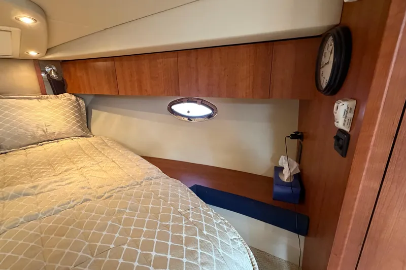 Slide: The Image of Interior cabin of 2009 Cruisers Yachts 360 Express with bed and wooden cabinetry. - 46