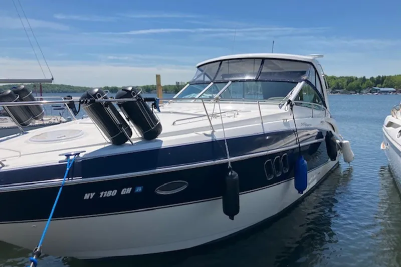Slide: The Image of 2009 Cruisers Yachts 360 Express docked on a sunny day. - 1