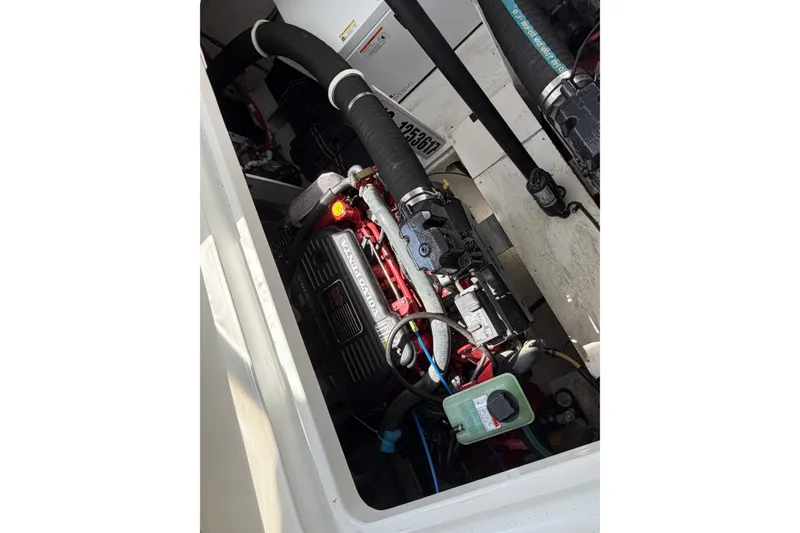 Slide: The Image of Engine compartment of a 2009 Cruisers Yachts 360 Express, featuring Volvo Penta components. - 60