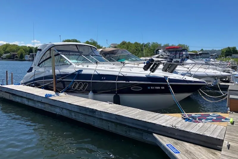 Slide: The Image of 2009 Cruisers Yachts 360 Express docked at marina on a sunny day. - 3