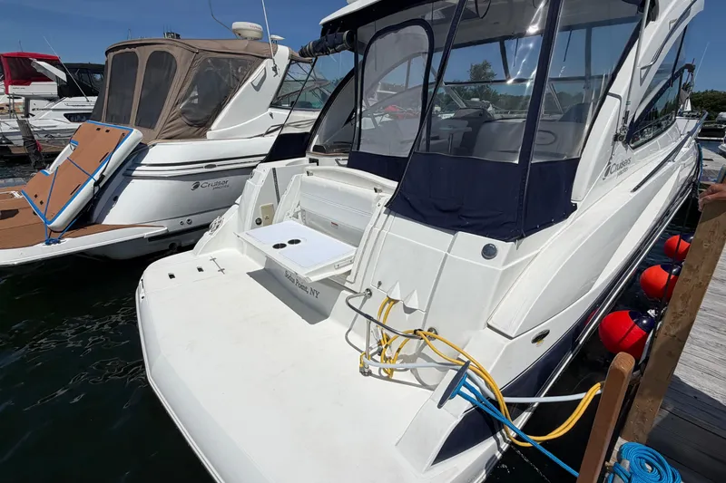 Slide: The Image of 2009 Cruisers Yachts 360 Express docked, featuring sleek design and modern amenities. - 12