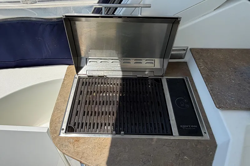 Slide: The Image of Built-in grill on 2009 Cruisers Yachts 360 Express, featuring Kenyon Custom design. - 17