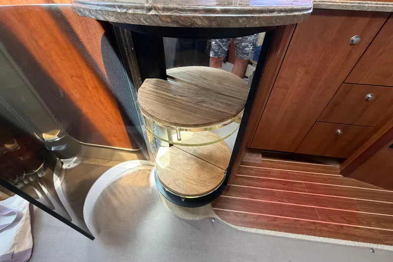 Slide: The Image of Interior of 2009 Cruisers Yachts 360 Express with wooden shelves and cabinetry. - 38