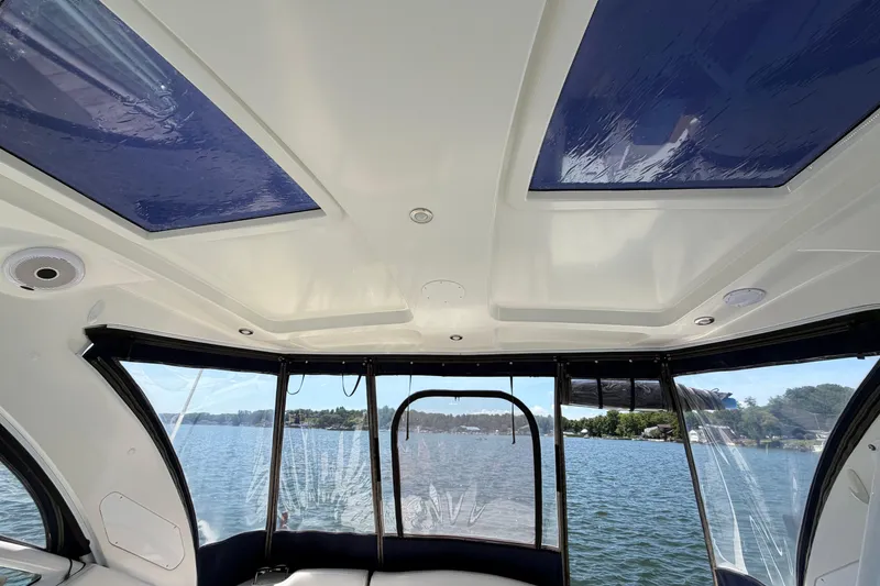 Slide: The Image of Interior view of 2009 Cruisers Yachts 360 Express with skylights and lake scenery. - 21