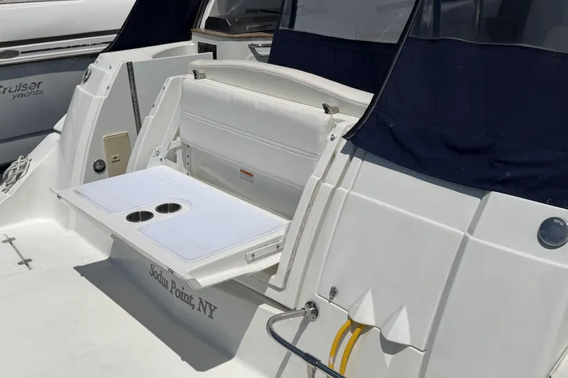 Slide: The Image of 2009 Cruisers Yachts 360 Express with foldable table and seating, docked at Sodus Point, NY. - 14