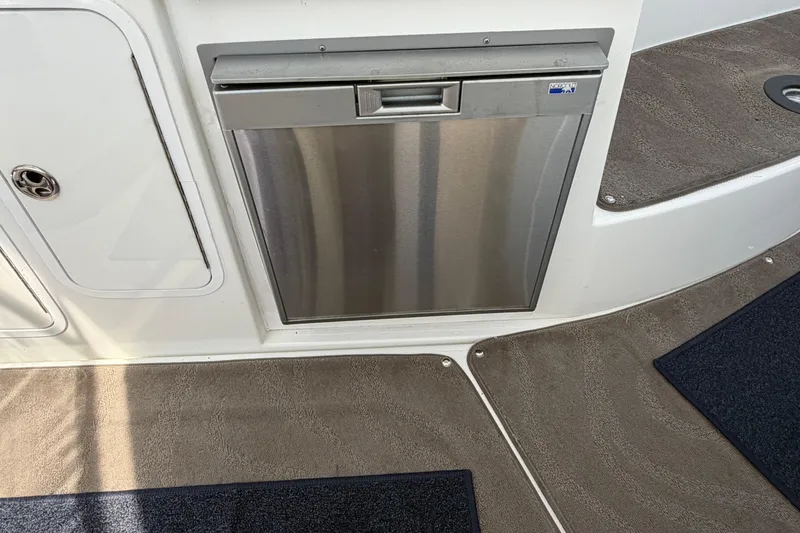 Slide: The Image of Stainless steel appliance on 2009 Cruisers Yachts 360 Express boat interior. - 24
