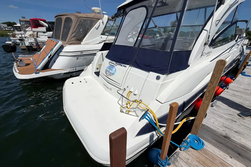 Slide: The Image of 2009 Cruisers Yachts 360 Express docked at marina, featuring sleek design and modern amenities. - 11