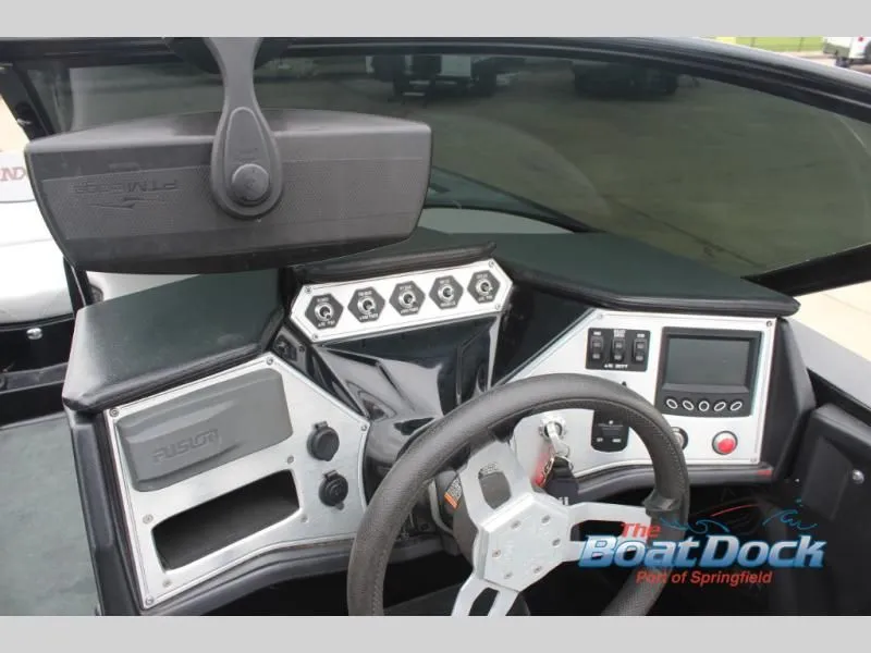 Slide: The Image of The image shows the dashboard of a 2017 X Series NXT 22 boat with modern controls. - 26