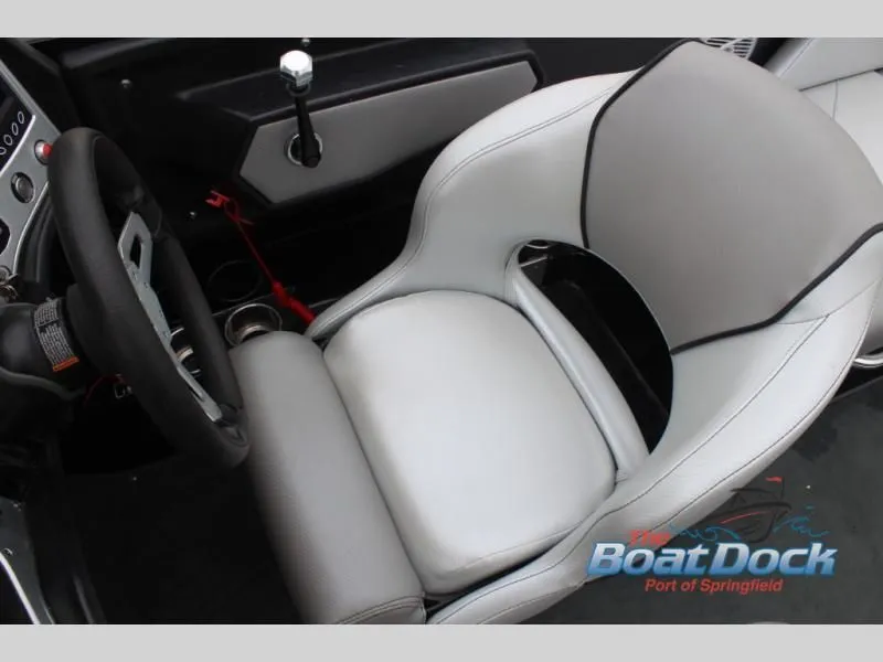 Slide: The Image of Interior view of a 2017 X Series NXT 22 with gray and white seating and steering wheel. - 29