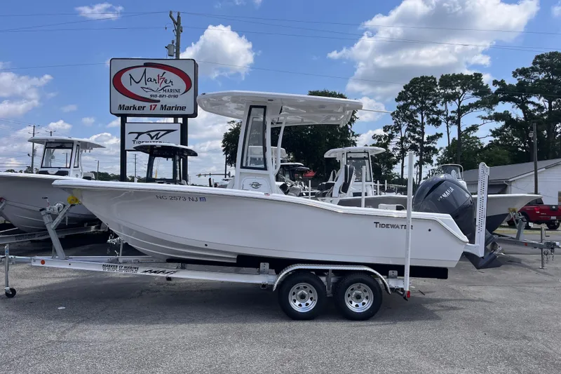 The Image of 2026 Tidewater 210 CC Adventure boat on trailer at Marker 17 Marine dealership. - 0