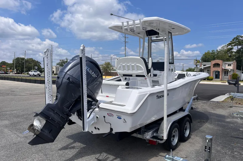 Slide: The Image of 2026 Tidewater 210 CC Adventure boat on trailer, featuring Yamaha outboard motor. - 4