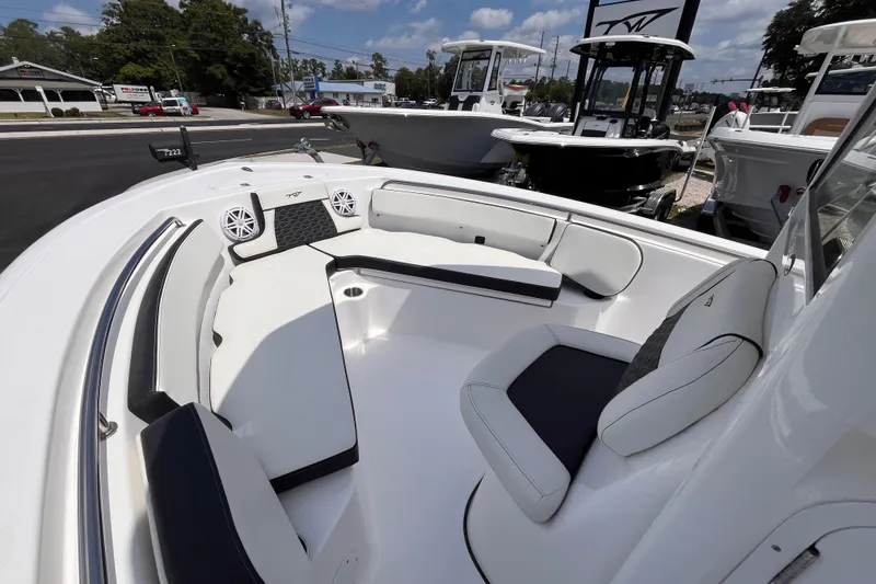 Slide: The Image of 2026 Tidewater 210 CC Adventure boat interior with sleek seating and modern design. - 12