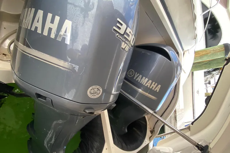 Slide: The Image of 2014 Pursuit SC 365i Sport Coupe with twin Yamaha 350 V8 outboard engines. - 63