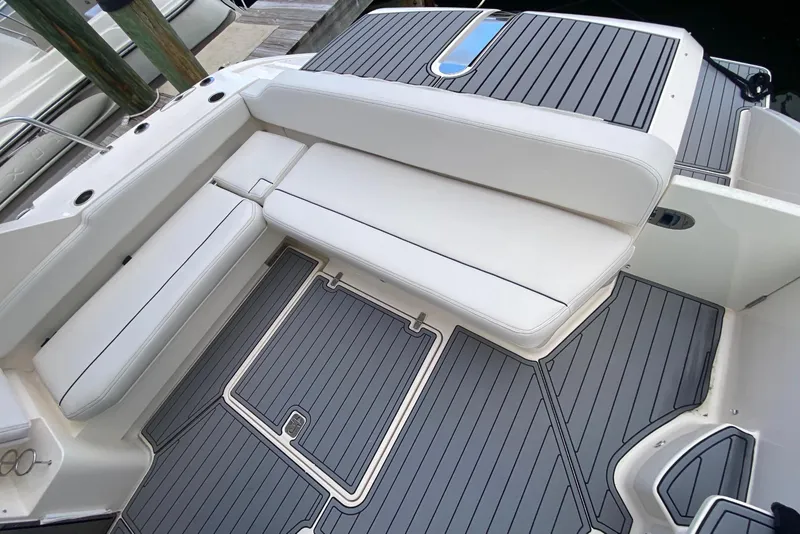 Slide: The Image of 2014 Pursuit SC 365i Sport Coupe deck with sleek seating and modern design. - 28