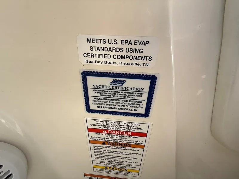 Slide: The Image of Stickers on a boat showing EPA standards and yacht certification. - 33