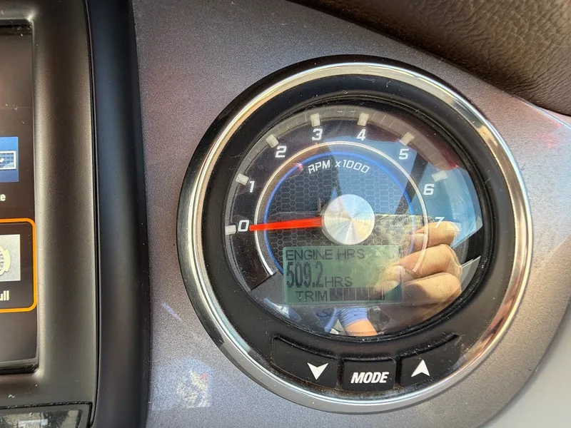 Slide: The Image of Close-up of a tachometer showing 509.2 engine hours on a Sea Ray SDX 290 boat. - 20