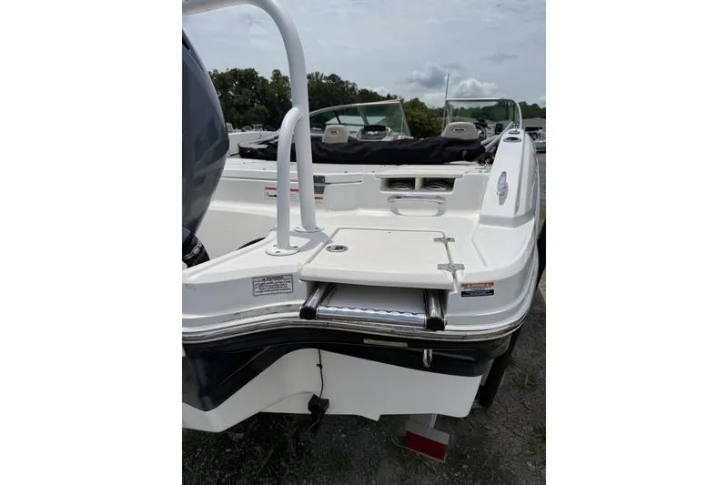 Slide: The Image of 2018 Chaparral 21 H2O Ski & Fish OB boat, rear view with swim platform. - 5