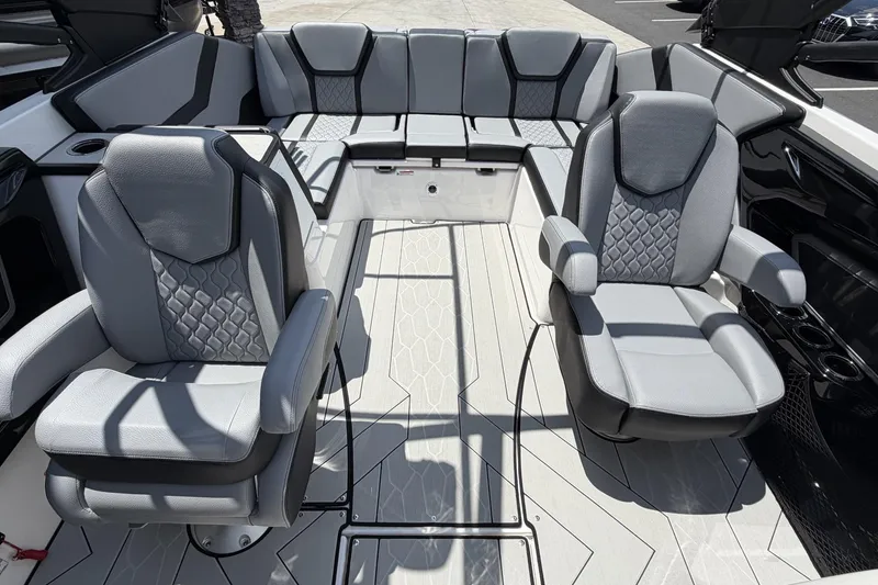 Slide: The Image of 2026 Yamaha Boats 255XE interior with luxurious seating and modern design. - 9