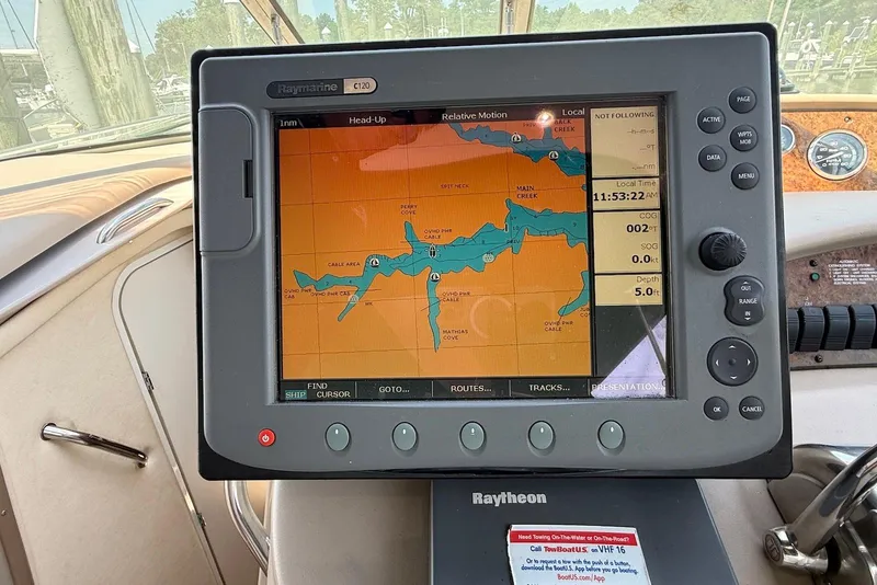 Slide: The Image of Raymarine C120 navigation display on 2001 Sea Ray 340 Sundancer boat dashboard. - 10