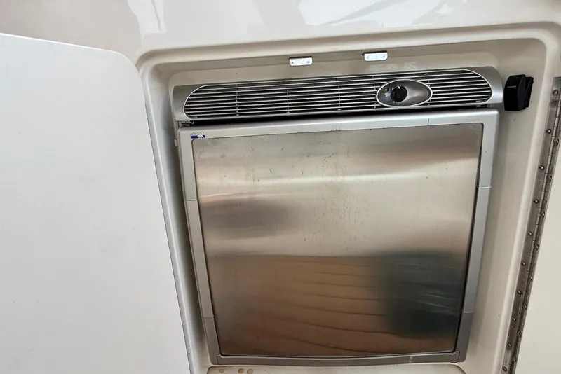Slide: The Image of Stainless steel refrigerator on 2001 Sea Ray 340 Sundancer boat. - 8