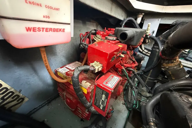 Slide: The Image of Engine compartment of a 2001 Sea Ray 340 Sundancer with Westerbeke generator. - 24
