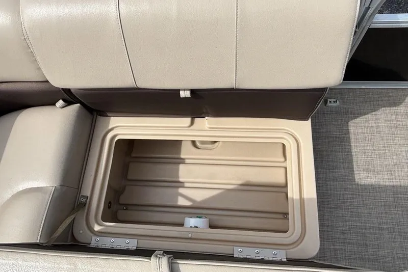 Slide: The Image of Open storage compartment in 2019 Sun Tracker Party Barge 22 RF DLX pontoon boat. - 19