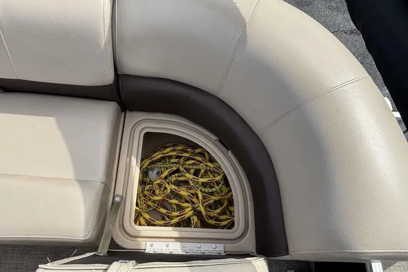 Slide: The Image of Storage compartment with rope on a 2019 Sun Tracker Party Barge 22 RF DLX boat. - 25